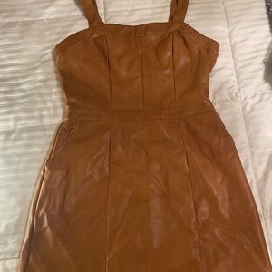 Woman’s brown dress